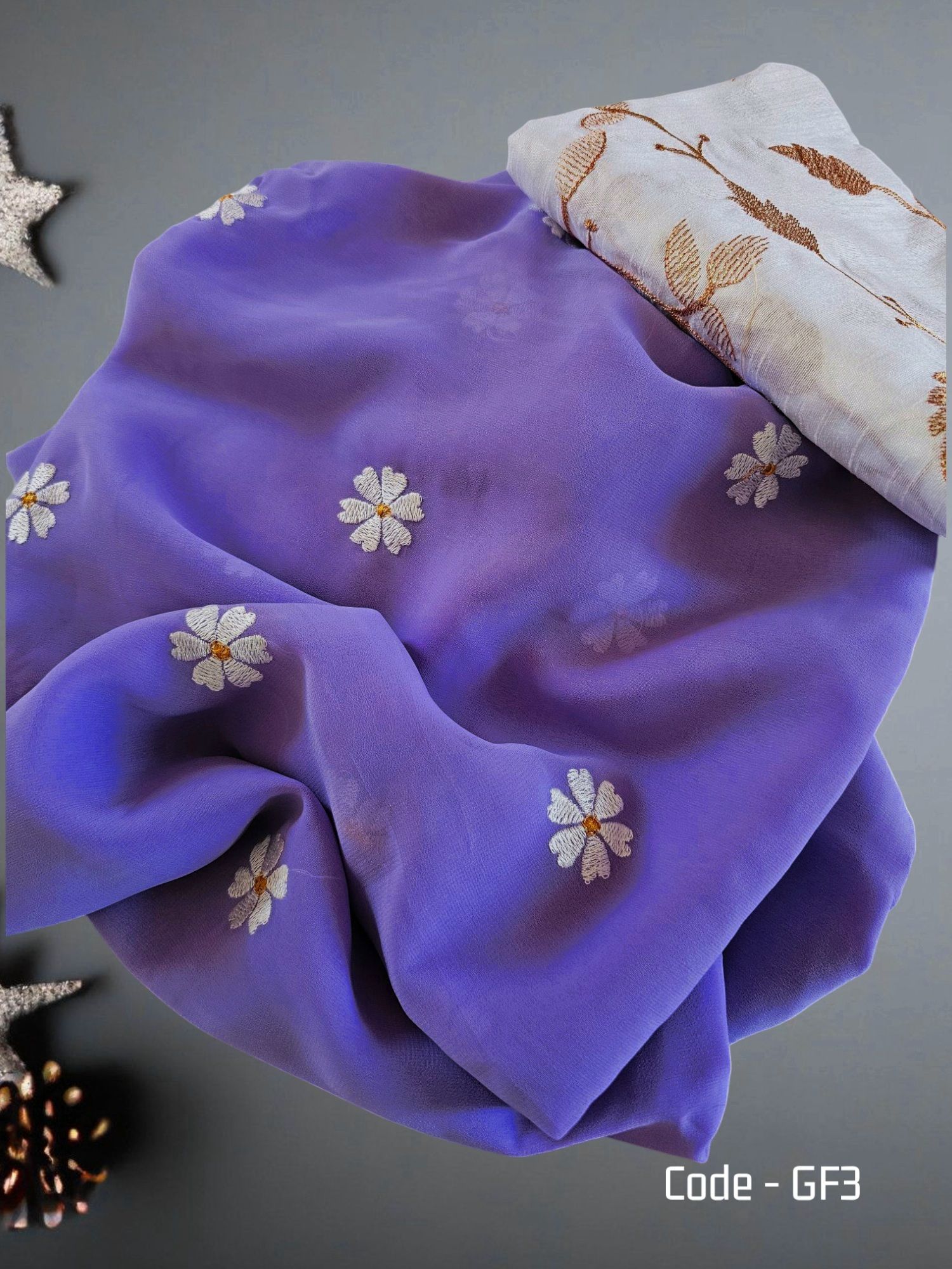 Georgette saree with embroidery and tassels